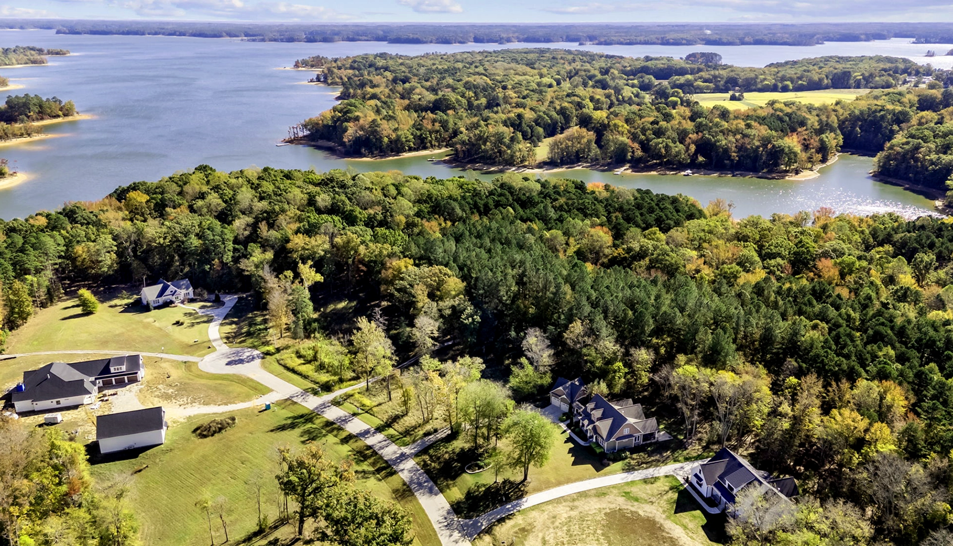 Custom homes near Kerr Lake NC surrounded by trees and open land